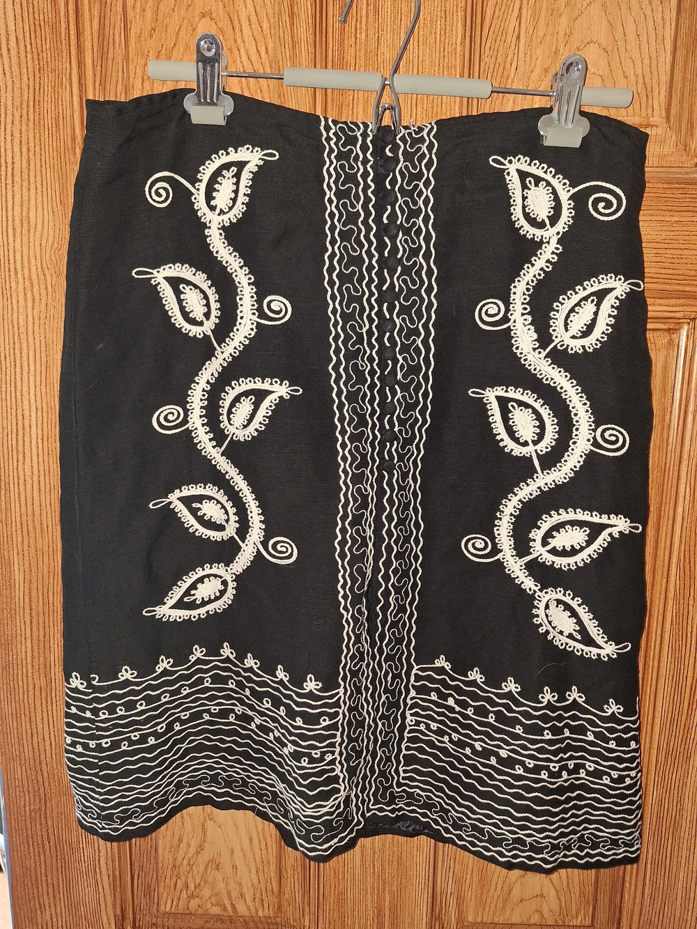 BCBGMaxAzria Black Midi Skirt with White Embroidered Paisley Motif